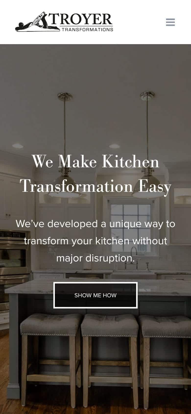 Troyer Transformations website design: the homepage on a phone